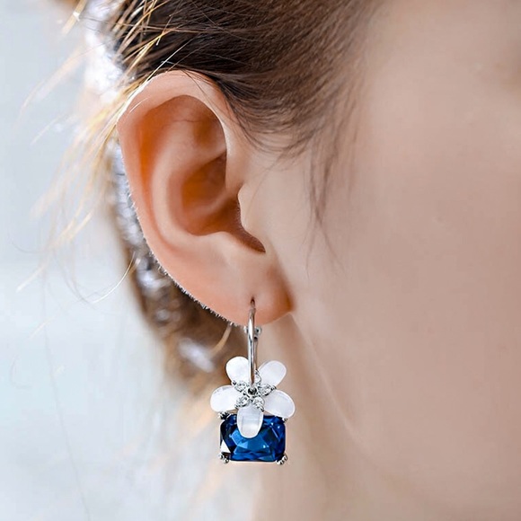 GlitzBlitz Jewelry - 2/$20!  Pearlescent Flower/Blue Crystal Hoops